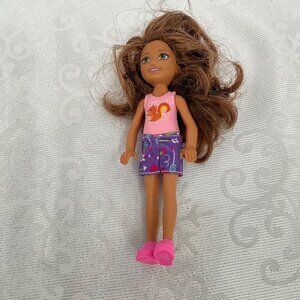 Barbie Chelsea Doll With Brown Hair In Pink Top & Purple Shorts With Pink Shoes